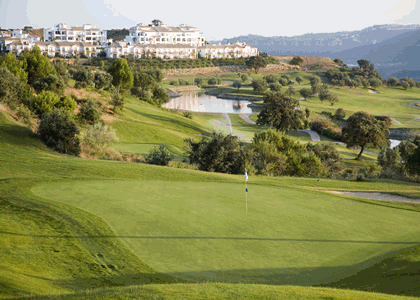 Views of Alhaurin Golf Course including clubhouse, driving range