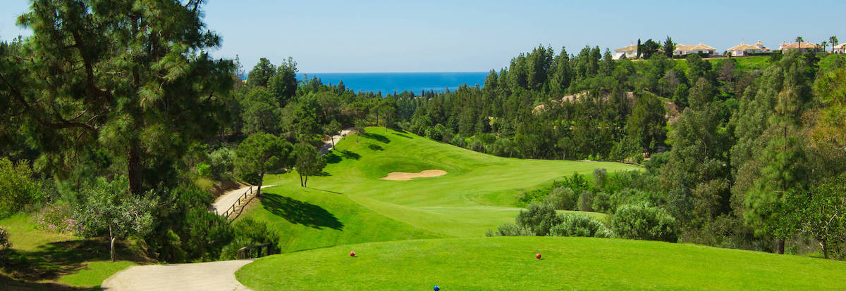 17th hole on El Chaparral Golf Club with view to the Mediterranean