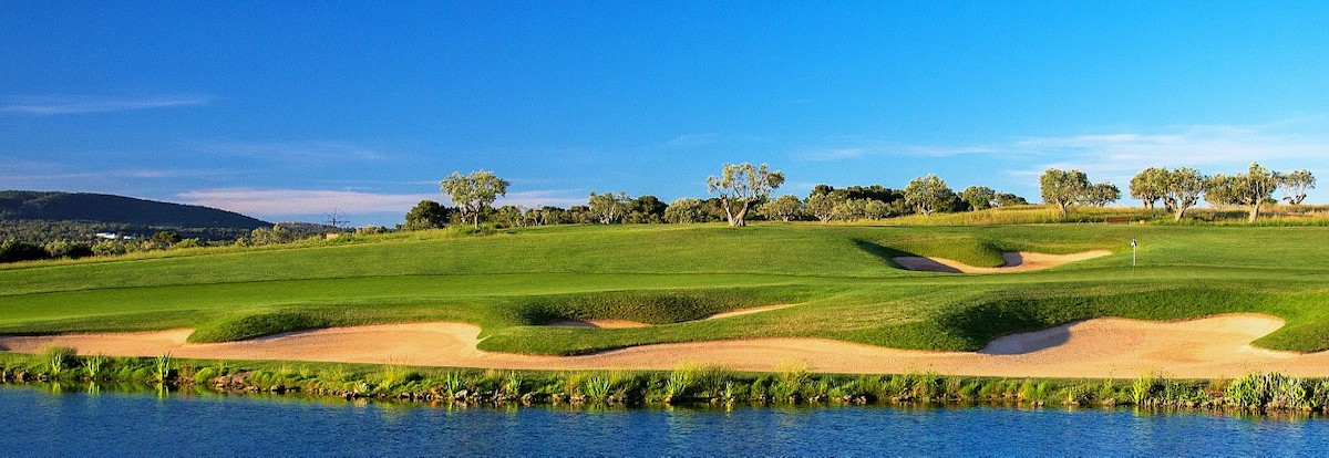 The 17th hole at Son Gual features contoured bunkers around the green