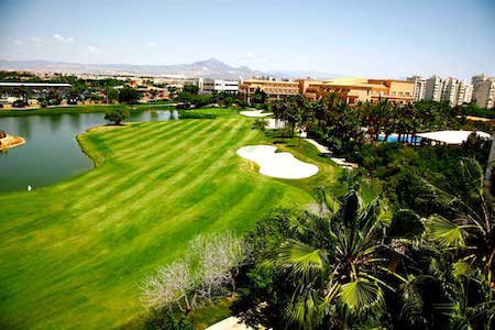 View of Alicante Golf fairway with lake on the left and the hotel on the right