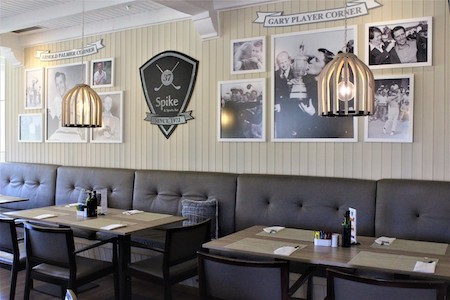 The 37 Spikes & Sports Bar's Terrace has a view of the golf practice area</em></figcaption></figure><br>
