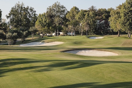 Bunkers guard a green on Guadalmina Golf