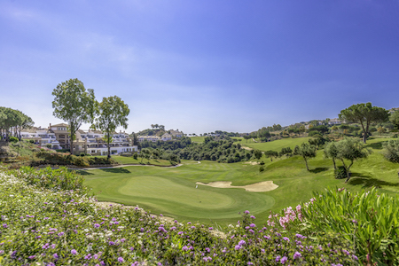 18th hole of Asia Course and La Cala Hotel