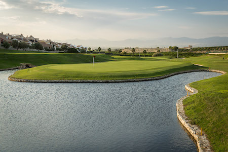 Green surrounded by water on La Finca Golf