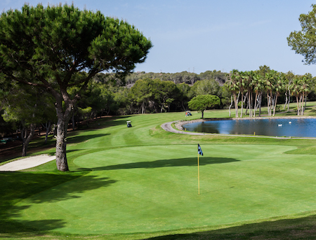 Water guards a green at  Las Ramblas Golf