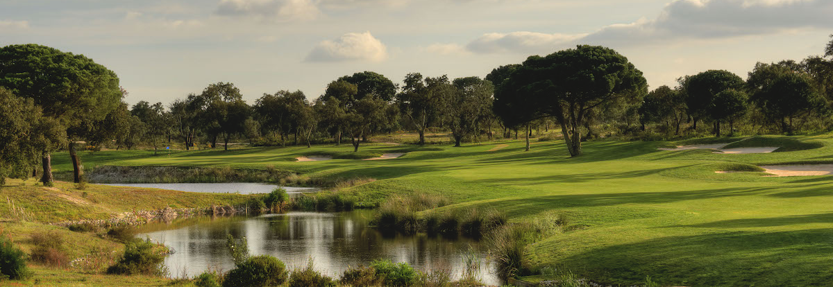 Water lined fairway on Ribagolfe Lakes course