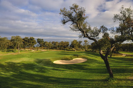 A large bunker guards this green on Ribagolfe Oaks course