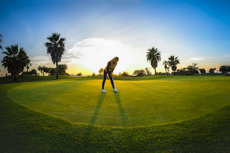 Player on the green at Roda Golf