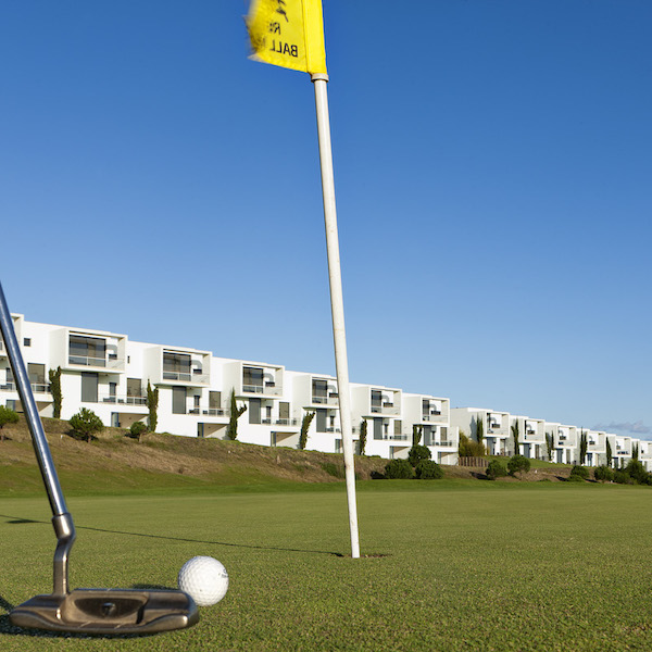 View of townhouses at Bom Sucesso Golf Resort and the golf course in the foreground