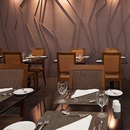 The tables at Oliva Restaurant at Dom Pedro Vilamoura.