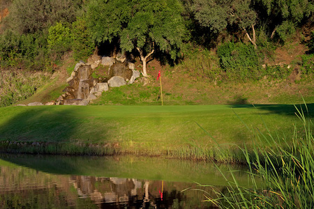 Water hazard guards a green on Marbella Golf & Country Club
