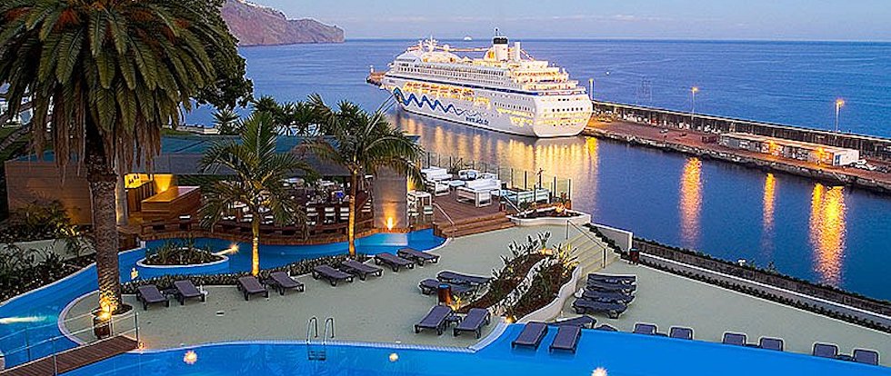View from the Pestana Casino Park Hotel including pool and cruise ship in port