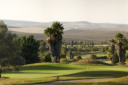 Palm trees dot the Sherry Golf Jerez golf coures