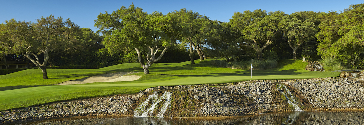 Green surrounded by cork oaks at Real Club Valderrama